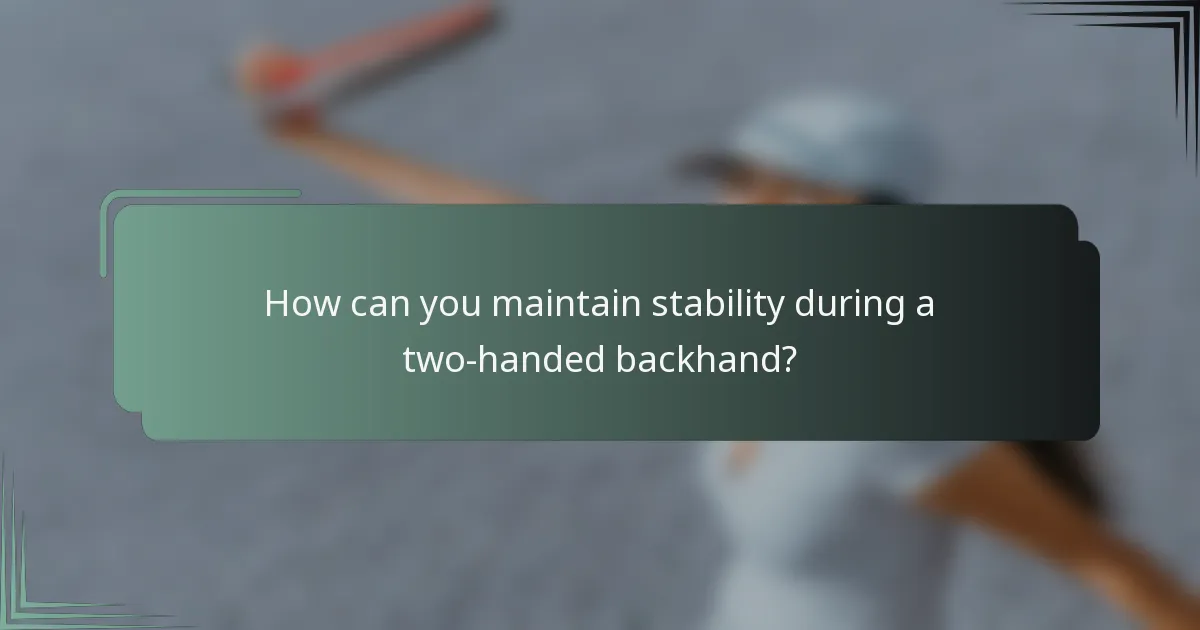 How can you maintain stability during a two-handed backhand?